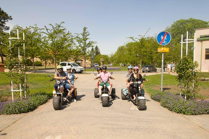 Experience the charm of Prague as you ride electric Trike Haleys exploring historical sights and legendary tales while enjoying picturesque views along the way. Adventure awaits!